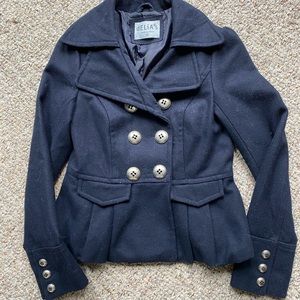 Navy peacoat with pleated peplum bottom